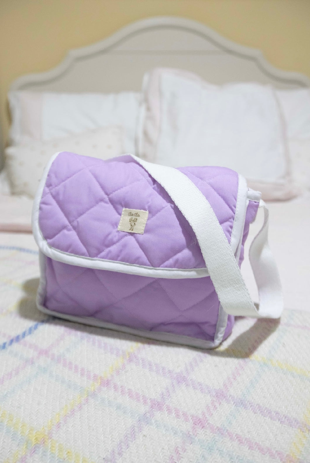 PAÑALERA MORADA CON ACCESORIOS